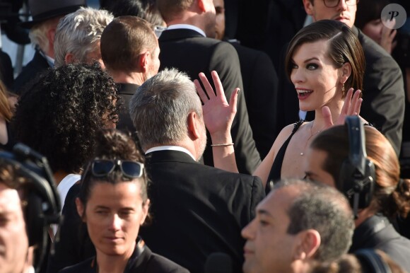 Milla Jovovich, face à Luc Besson, à la montée des marches du film "The Last Face" lors du 69ème Festival International du Film de Cannes le 20 mai 2016. © Lionel Urman / Bestimage