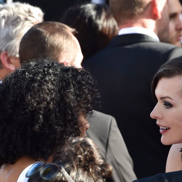 Luc Besson avec sa femme Virginie Silla et son ex-femme Milla Jovovich à la montée des marches du film "The Last Face" lors du 69ème Festival International du Film de Cannes le 20 mai 2016. © Lionel Urman / Bestimage