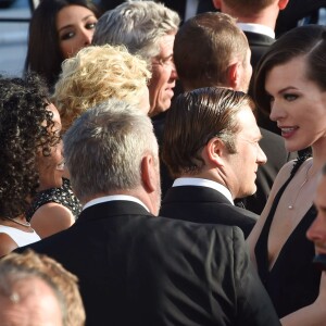 Luc Besson avec sa femme Virginie Silla et son ex-femme Milla Jovovich à la montée des marches du film "The Last Face" lors du 69ème Festival International du Film de Cannes le 20 mai 2016. © Lionel Urman / Bestimage