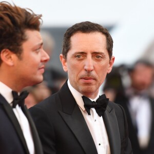 Kev Adams et Gad Elmaleh à la montée des marches du film "Elle" lors du 69ème Festival International du Film de Cannes. Le 21 mai 2016.