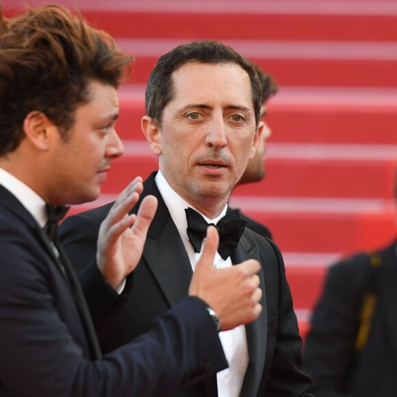 Kev Adams et Gad Elmaleh à la montée des marches du film "Elle" lors du 69ème Festival International du Film de Cannes. Le 21 mai 2016.