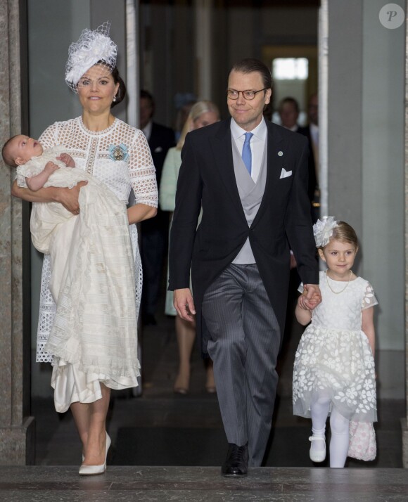 La princesse Victoria de Suède et son fils le prince Oscar, le prince Daniel de Suède et sa fille la princesse Estelle - Baptême du prince Oscar de Suède à Stockholm en Suède le 27 mai 2016.
