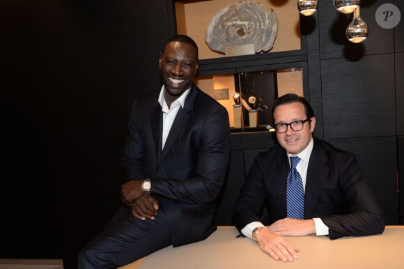 Semi-exclusif - Omar Sy (ambassadeur de la marque), François-Henry Bennahmias (CEO d'Audemars Piguet) - Inauguration de la boutique Audemars Piguet, 15 rue Royale, et présentation de la nouvelle collection Royal Oak Yellow Gold, à Paris, le 26 mai 2016. © Rachid Bellak/Bestimage