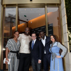 Semi-exclusif - François-Henry Bennahmias (CEO d'Audemars Piguet) entre Teddy Riner et sa compagne Luthna, et Omar Sy (ambassadeur de la marque) et sa femme Hélène - Inauguration de la boutique Audemars Piguet, 15 rue Royale, et présentation de la nouvelle collection Royal Oak Yellow Gold, à Paris, le 26 mai 2016. © Rachid Bellak/Bestimage