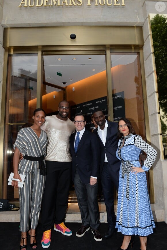 Semi-exclusif - François-Henry Bennahmias (CEO d'Audemars Piguet) entre Teddy Riner et sa compagne Luthna, et Omar Sy (ambassadeur de la marque) et sa femme Hélène - Inauguration de la boutique Audemars Piguet, 15 rue Royale, et présentation de la nouvelle collection Royal Oak Yellow Gold, à Paris, le 26 mai 2016. © Rachid Bellak/Bestimage