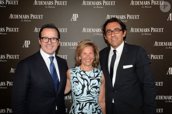 Semi-exclusif - François-Henry Bennahmias (CEO d'Audemars Piguet), Iris Knobloch (présidente de Warner France) et son compagnon François Bréavoine - Inauguration de la boutique Audemars Piguet, 15 rue Royale, et présentation de la nouvelle collection Royal Oak Yellow Gold, à Paris, le 26 mai 2016. © Rachid Bellak/Bestimage