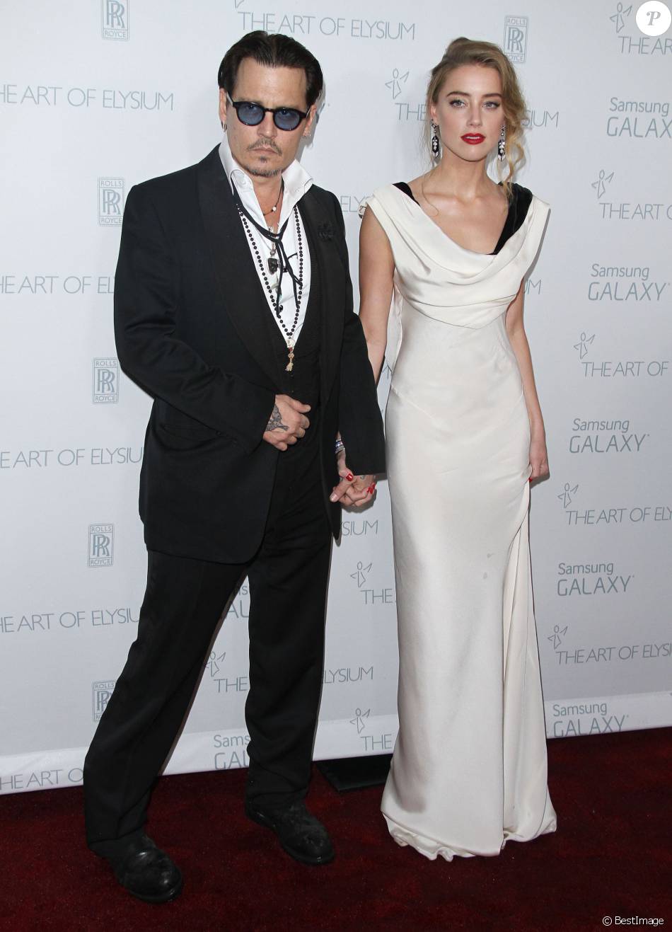The Lady Of Heaven Sortie France Johnny Depp, Amber Heard au gala The Art of Elysium Heaven à Santa