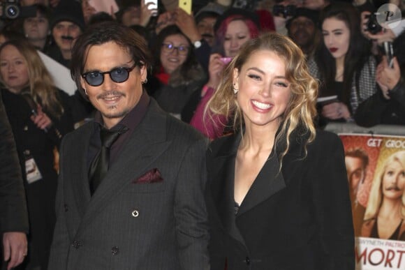 Johnny Depp et sa fiancée Amber Heard - Première du film "Charlie Mortdecai" à l'Empire, Leicester Square, à Londres, le 19 janvier 2015.