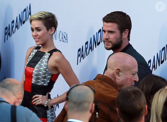 Miley Cyrus et Liam Hemsworth - Première du film "Paranoia" à Los Angeles, le 8 août 2013.