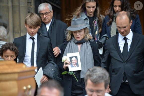 Anouchka Rousselet (la veuve d'André Rousselet), Nicolas Rousselet et la famille à la sortie des obsèques de André Rousselet en la Basilique Sainte-Clotilde de Paris le 2 juin 2016.02/06/2016 - Paris