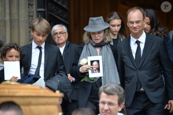 Anouchka Rousselet (la veuve d'André Rousselet), Nicolas Rousselet et la famille à la sortie des obsèques de André Rousselet en la Basilique Sainte-Clotilde de Paris le 2 juin 2016.02/06/2016 - Paris