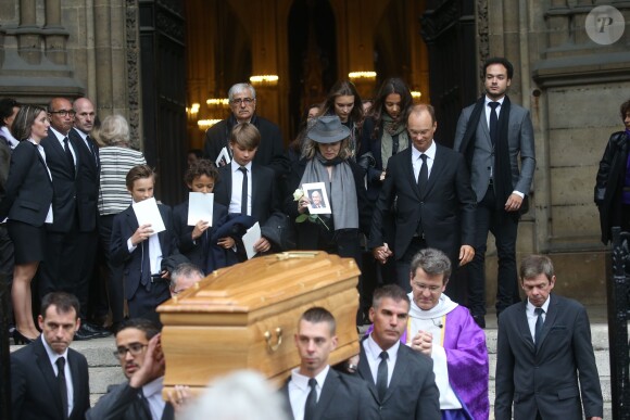 Anouchka Rousselet (la veuve d'André Rousselet), Nicolas Rousselet et la famille à la sortie des obsèques de André Rousselet en la Basilique Sainte-Clotilde de Paris le 2 juin 2016.02/06/2016 - Paris