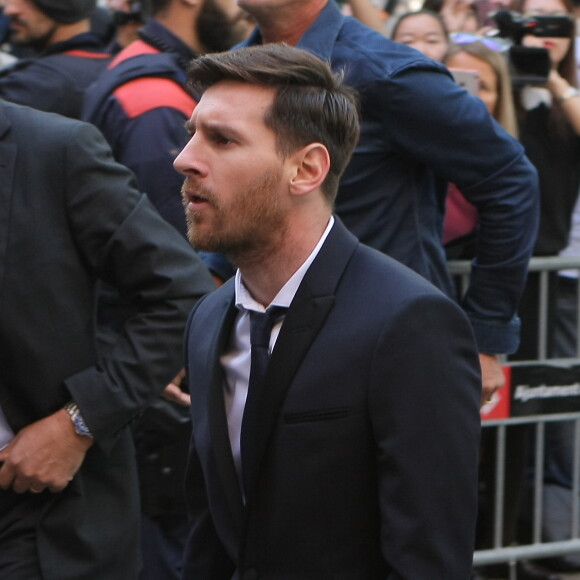 Lionel Messi et son père Jorge Horacio Messi arrivent au tribunal pour son procès pour fraude fiscale à Barcelone, le 2 juin 2016.