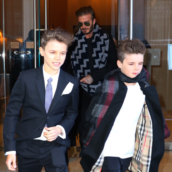 David Beckham et ses enfants Brooklyn, Romeo, Harper et Cruz sortent de leur hôtel alors que Victoria prépare les défilés pour la fashion week à New York le 13 février 2016.