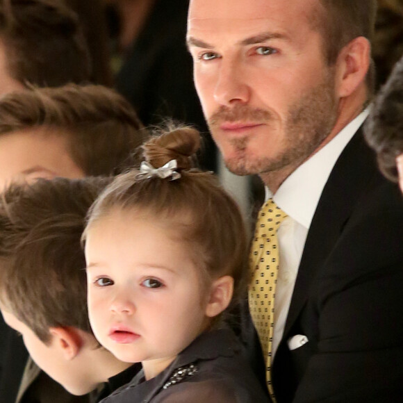 David Beckham et ses enfants Brooklyn, Romeo, Cruz et Harper assistent au défilé de Victoria Beckham, collection prêt-à-porter automne 2014 à New York, le 9 février 2014.