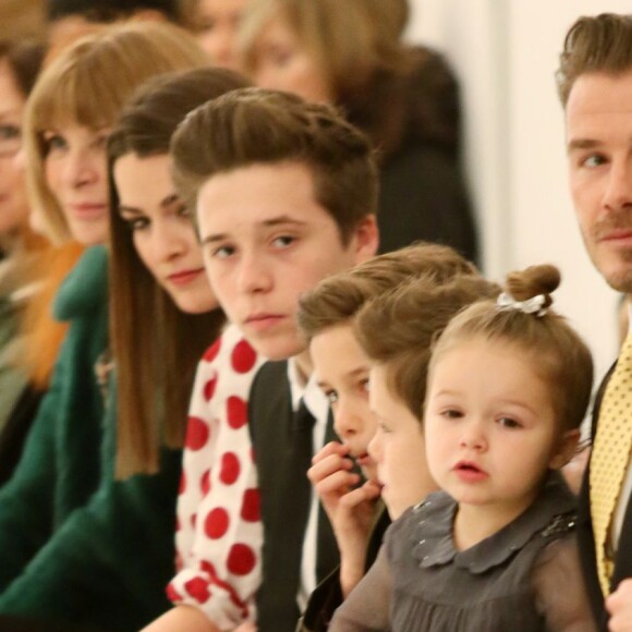 David Beckham et ses enfants Brooklyn, Romeo, Cruz et Harper assistent au défilé de Victoria Beckham, collection prêt-à-porter automne 2014 à New York, le 9 février 2014.