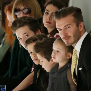 David Beckham et ses enfants Brooklyn, Romeo, Cruz et Harper assistent au défilé de Victoria Beckham, collection prêt-à-porter automne 2014 à New York, le 9 février 2014.