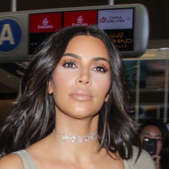 Kim Kardashian et Kanye West arrivent à l'aéroport de Los Angeles (LAX), le 12 juin 2016. Kim Kardashian and Kanye West arrive at Los Angeles airport (LAX).