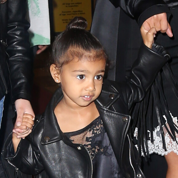 Kim Kardashian et son mari Kanye West sont allés voir The Lion King' avec leur fille North West à New York, le 5 juin 2016