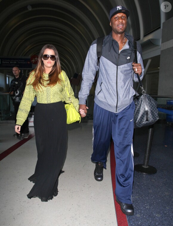 Lamar Odom et Khloé Kardashian arrivent à l'aéroport de Los Angeles, le 4 mai 2012