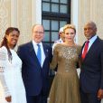 La princesse Charlene et le prince Albert de Monaco avec Danny Glover et sa femme Eliane lors du cocktail organisé le 14 juin 2016 dans la cour du palais princier en marge du 56e Festival de Télévision de Monte-Carlo. © Pool Festival TV Monaco / BestImage