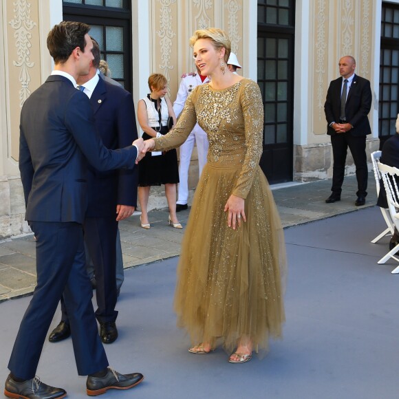 La princesse Charlene de Monaco et Cory Michael Smith lors du cocktail organisé le 14 juin 2016 dans la cour du palais princier en marge du 56e Festival de Télévision de Monte-Carlo. © Pool Festival TV Monaco / BestImage