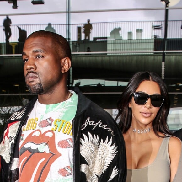 Kim Kardashian et son mari Kanye West arrivent à l'aéroport de Roissy-Charles-de-Gaulle, puis vont déjeuner au restaurant "L'Avenue" à Paris, le 13 juin 2016.