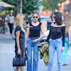 Gigi Hadid, Kendall Jenner et Hailey Baldwin très souriantes à la sortie du restaurant "The Smile" à New York, le 21 juin 2016. Kendall porte un haut transparent qui laisse entrevoir sa poitrine et son piercing!