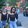 Gigi Hadid, Kendall Jenner et Hailey Baldwin très souriantes à la sortie du restaurant "The Smile" à New York, le 21 juin 2016. Kendall porte un haut transparent qui laisse entrevoir sa poitrine et son piercing!