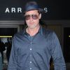 Brad Pitt arrive à l'aéroport de Los Angeles, en provenance de France, après avoir assisté aux 24 heures du Mans, le 21 juin 2016.