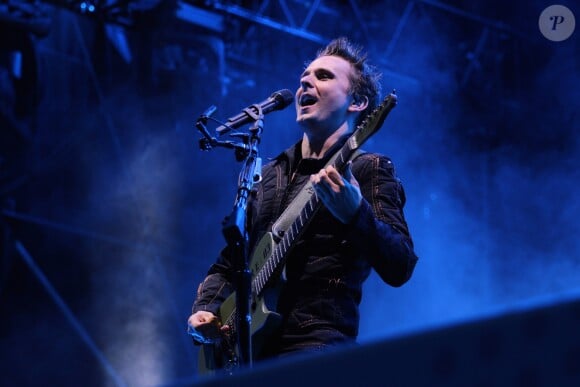 Matthew Bellamy et son groupe Muse en concert dans la Fan Zone de la Tour Eiffel, à Paris, le 28 juin 2016. © Lise Tuillier