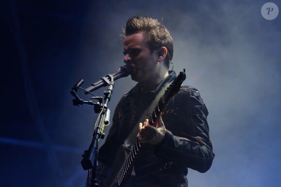 Matthew Bellamy et son groupe Muse en concert dans la Fan Zone de la Tour Eiffel, à Paris, le 28 juin 2016. © Lise Tuillier