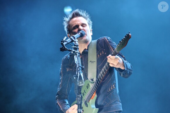 Matthew Bellamy et son groupe Muse en concert dans la Fan Zone de la Tour Eiffel, à Paris, le 28 juin 2016. © Lise Tuillier
