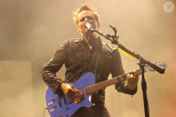 Matthew Bellamy et son groupe Muse en concert dans la Fan Zone de la Tour Eiffel, à Paris, le 28 juin 2016. © Lise Tuillier