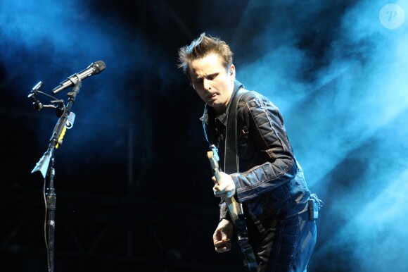 Matthew Bellamy et son groupe Muse en concert dans la Fan Zone de la Tour Eiffel, à Paris, le 28 juin 2016. © Lise Tuillier