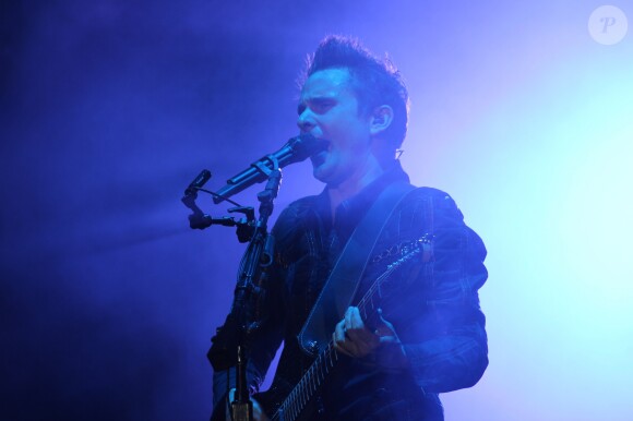 Matthew Bellamy et son groupe Muse en concert dans la Fan Zone de la Tour Eiffel, à Paris, le 28 juin 2016. © Lise Tuillier