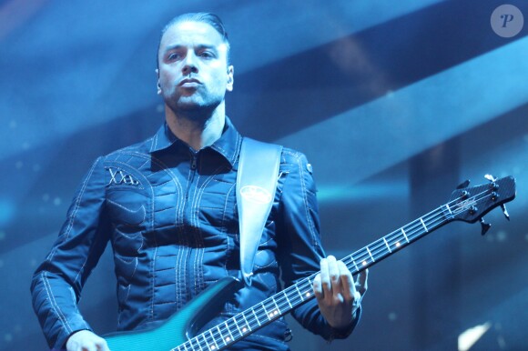 Christopher Wolstenholme - Matthew Bellamy et son groupe Muse en concert dans la Fan Zone de la Tour Eiffel, à Paris, le 28 juin 2016. © Lise Tuillier
