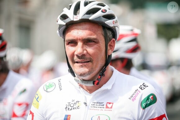 Richard Virenque - Dany Boon sur la 20ème étape du Tour de France lors de l'Etape du Coeur pour le compte de Mécénat Chirurgie Cardiaque à Périgueux le 26 juillet 2014.