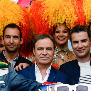 Michel Polnareff, sa compagne Danyellah et leur fils Louka, Fabien Lecoeuvre, Laurent Luyat, Gilbert Coullier et Cyril Féraud - Le chanteur français Michel Polnareff fête son 72ème anniversaire en présence des danseuses du Moulin-Rouge et donne le départ de la deuxième étape de la 103ème édition de la course cycliste du tour de France le 3 Juillet 2016, entre Saint-Lo et Cherbourg-en-Cotentin, en Normandie. © Coadic Guirec / Bestimage