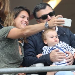 Amélie Mauresmo et son fils Aaron lors du match du quart de finale de l'UEFA Euro 2016 France-Islande au Stade de France à Saint-Denis, France le 3 juillet 2016. L'ex-championne de tennis a retrouvé la compagnie de Yannick Noah dans les gradins. © Cyril Moreau/Bestimage 