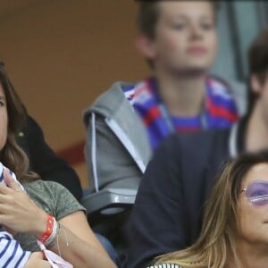 Amélie Mauresmo et son fils Aaron lors du match du quart de finale de l'UEFA Euro 2016 France-Islande au Stade de France à Saint-Denis, France le 3 juillet 2016. L'ex-championne de tennis a retrouvé la compagnie de Yannick Noah dans les gradins. © Cyril Moreau/Bestimage 