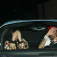 Kylie Jenner et son ex compagnon Tyga arrivent en voiture en essayant de se masquer le visage, la rumeur dit qu'ils seraient à nouveau en couple à West Hollywood le 25 juin 2016.