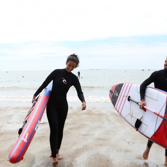 Flora Coquerel (miss France 2014) et son compagnon Hugo Cuilla à la Course de Stand-Up Paddle lors de la Summer Cup 2016 à La Baule le 9 juillet 2016. La Summer Cup 2016, 6ème édition, est l'un des plus grands rassemblement de stand-Up Paddle d'Europe. © Laetitia Notarianni / Bestimage09/07/2016 - La Baule