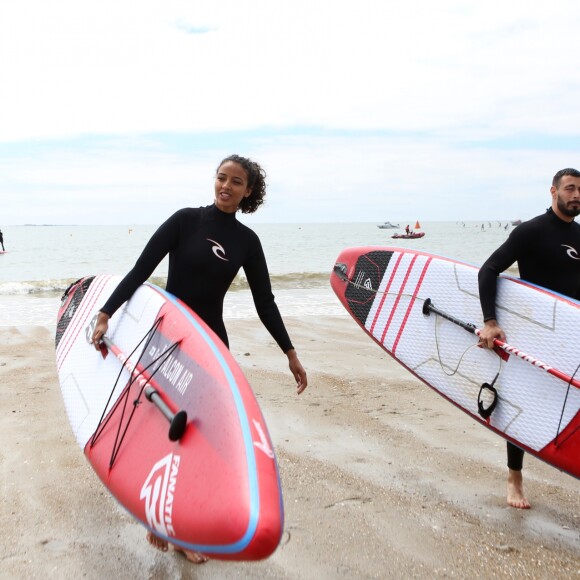 Flora Coquerel (miss France 2014) et son compagnon Hugo Cuilla à la Course de Stand-Up Paddle lors de la Summer Cup 2016 à La Baule le 9 juillet 2016. La Summer Cup 2016, 6ème édition, est l'un des plus grands rassemblement de stand-Up Paddle d'Europe. © Laetitia Notarianni / Bestimage09/07/2016 - La Baule