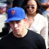 Nick Jonas et Demi Lovato lors d'un match des Mets dugout à New York, le 7 juillet 2016