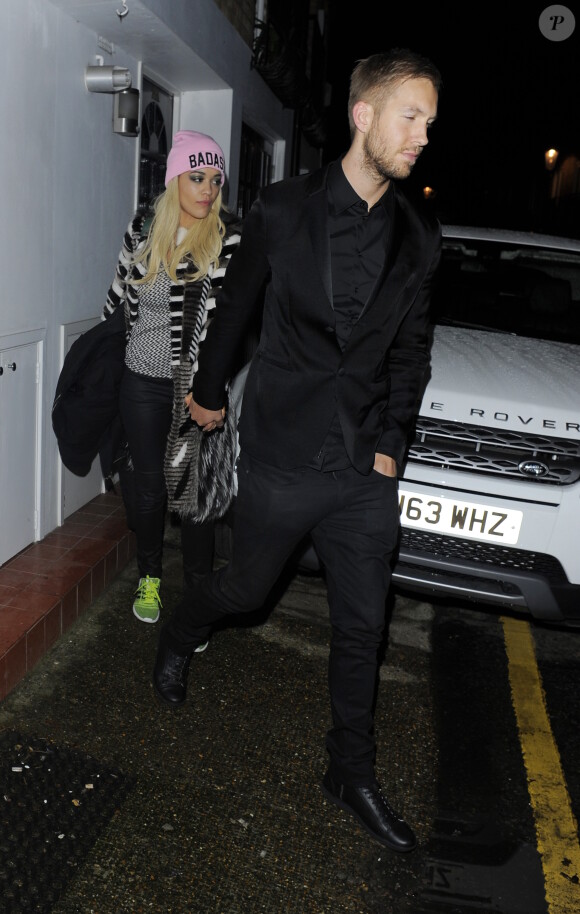 Rita Ora et son petit ami Calvin Harris à la sortie de l'After-Party de la soirée des Brit Awards à Londres, le 19 février 2014.