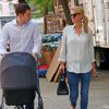 Les jeunes parents Nicky Hilton, son mari James Rothschild et leur fille Lily-Grace se promènent à New York, le 11 juillet 2016, quelques jours après la naissance de leur bébé.11/07/2016 - New York