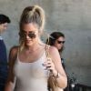 Les soeurs Kim et Khloe Kardashian à la sortie des studios Milk à Hollywood. Khloe porte une robe très moulante sans soutien gorge! Le 19 juillet 2016