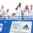 Teddy Riner et l'équipe de France olympique à son retour des Jeux de Londres - Sur les Champs-Elysées à Paris, le 13 août 2012.