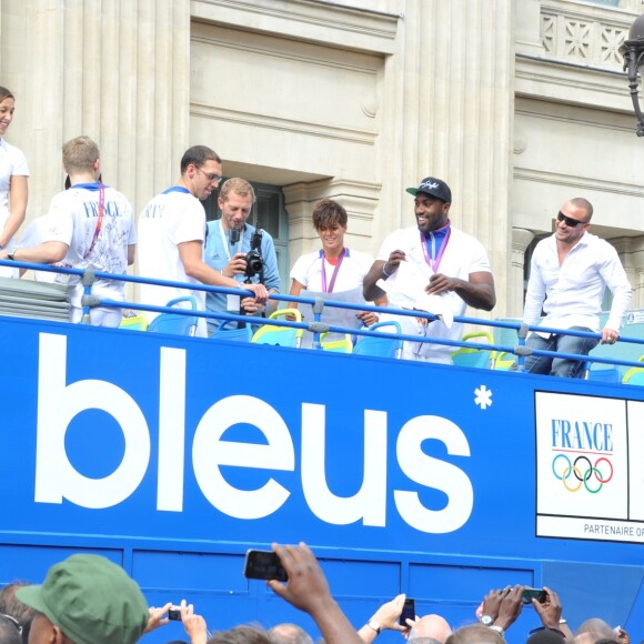 Teddy Riner et l'équipe de France olympique à son retour des Jeux de Londres - Sur les Champs-Elysées à Paris, le 13 août 2012.